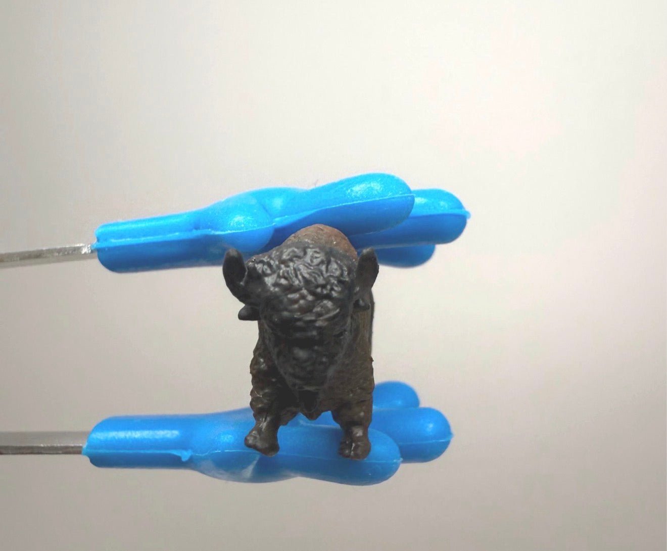 Miniature Bison Figurine - Speech and Smile
