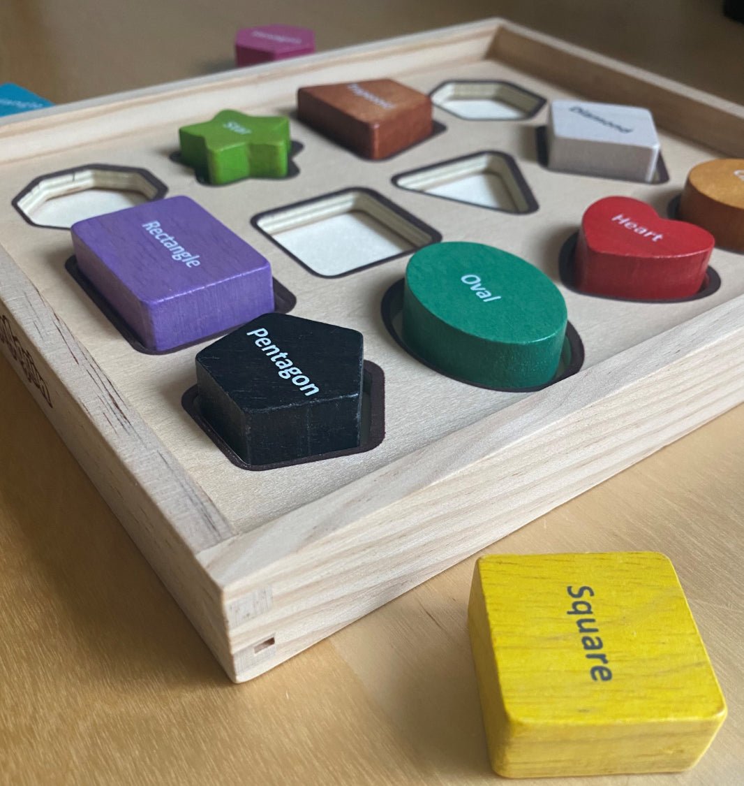Wood Shape Sorter Puzzle 12 Chunky Wood Shapes with Name of Shape Written on Each - Speech and Smile